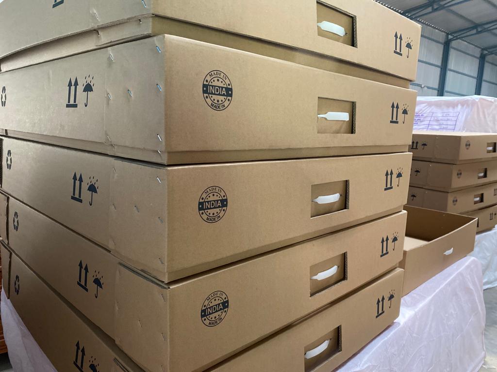 Made-in-India corrugated shippers with hand-holds